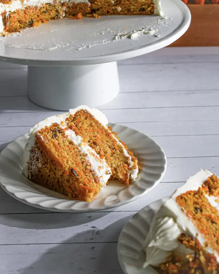 Eggless Carrot Cake with cream cheese frosting and can be made vegan dairy-free.