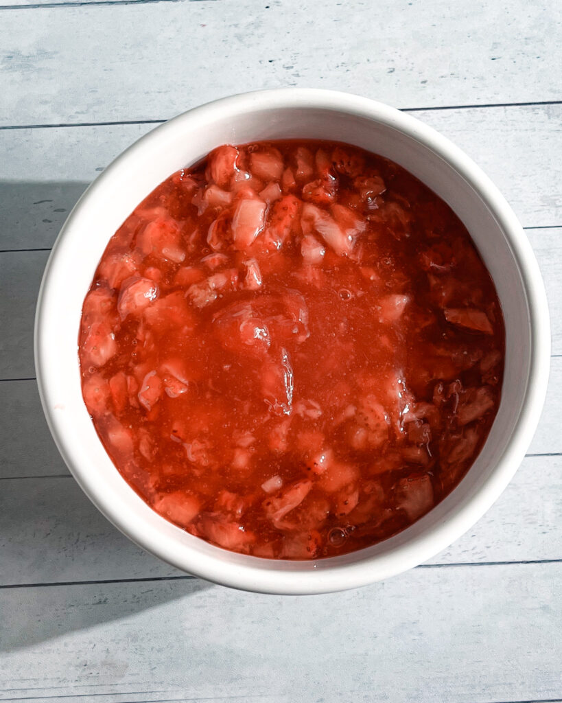 How to prevent strawberries from bleeding into whipped cream frosting