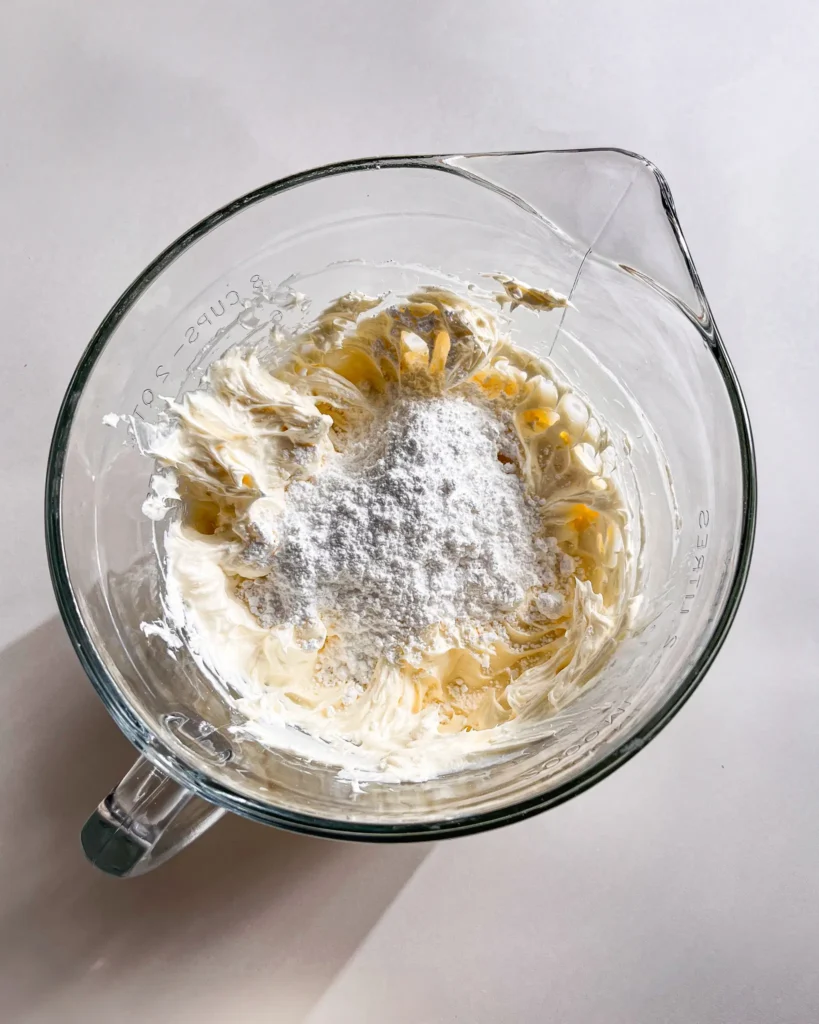 orange cake with whipped cream cheese frosting