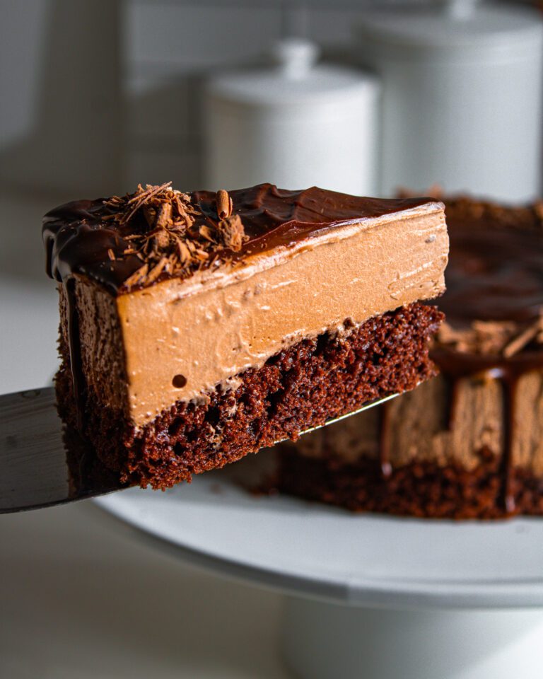 slice of Bakery-style eggless chocolate mousse cake made without gelatin.