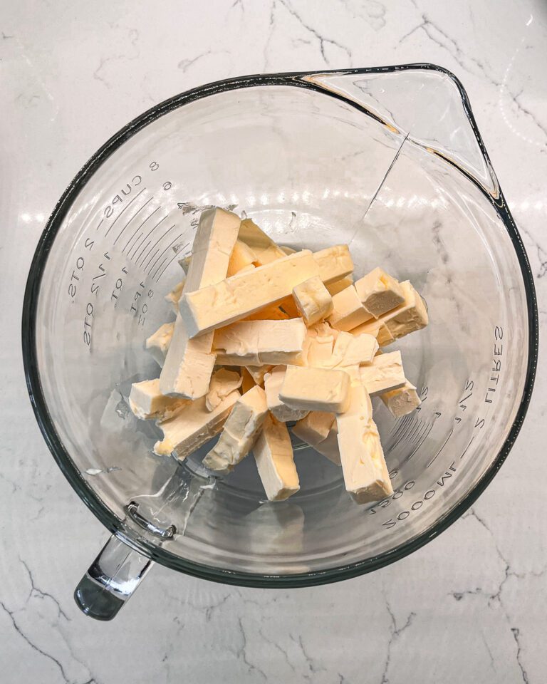 Beating butter until light and creamy for chocolate buttercream