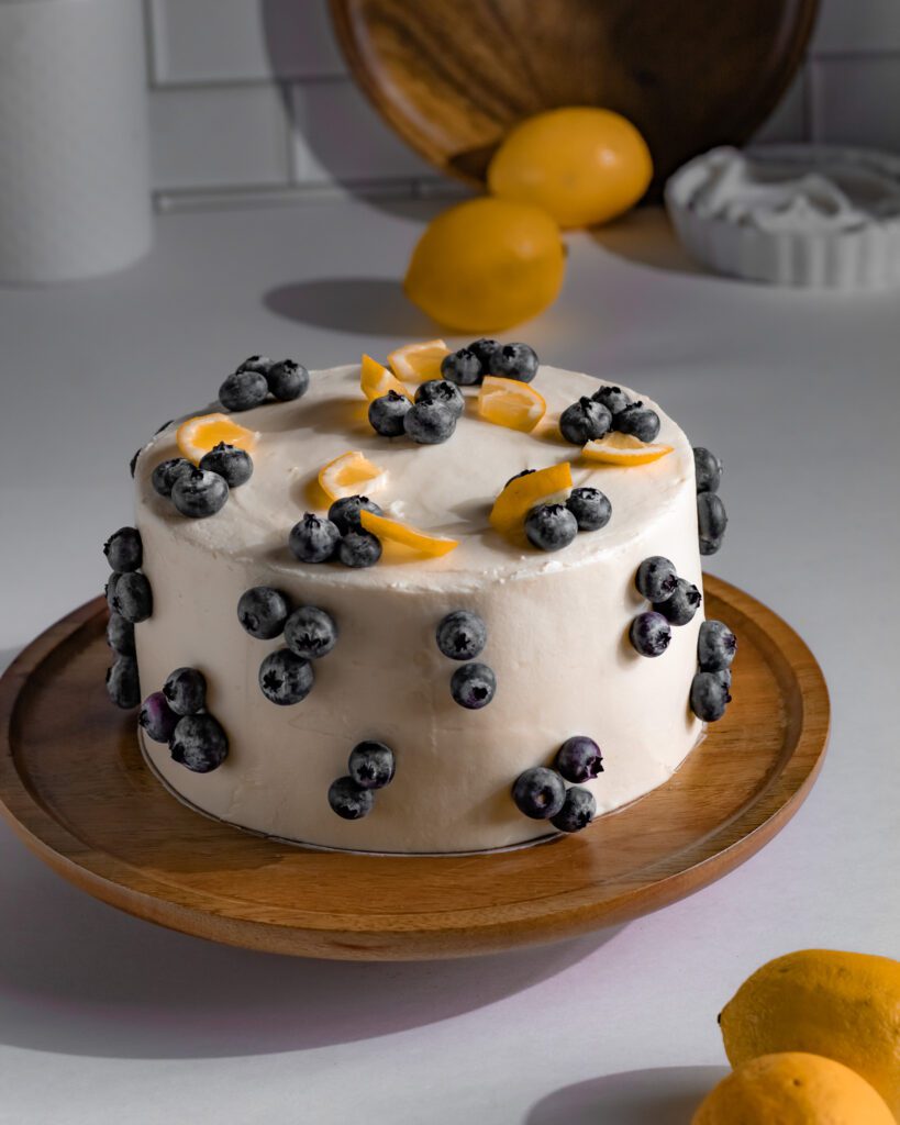 Eggless Vegan blueberry cake with thick creamy frosting layer