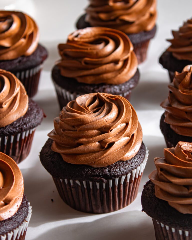 Eggless Vegan chocolate cupcakes topped with smooth chocolate icing