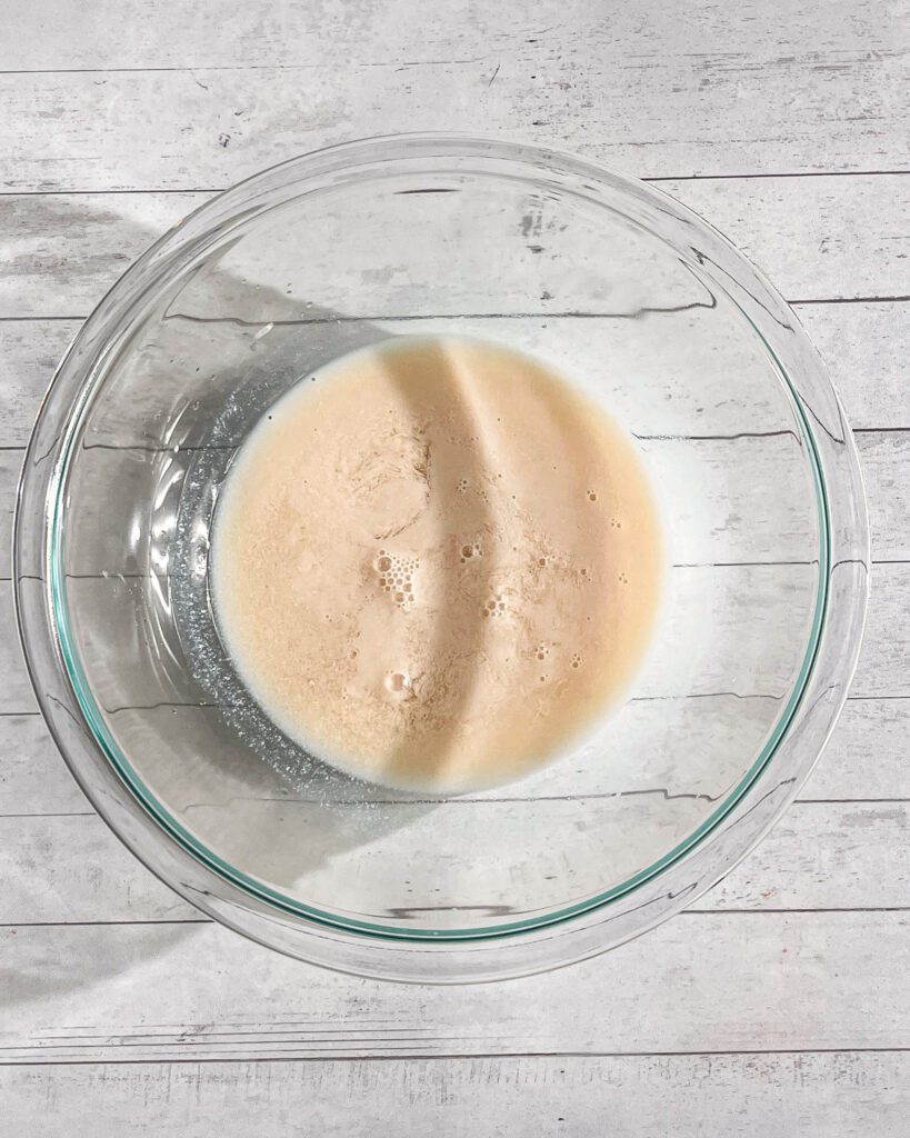 Wet ingredients being mixed for vegan chocolate cupcake batter