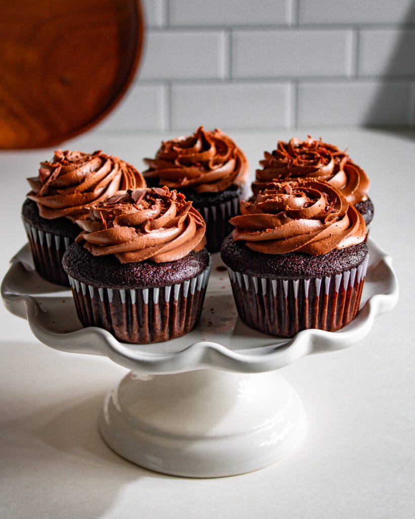 super moist eggless dairy-free chocolate cupcakes with creamy frosting