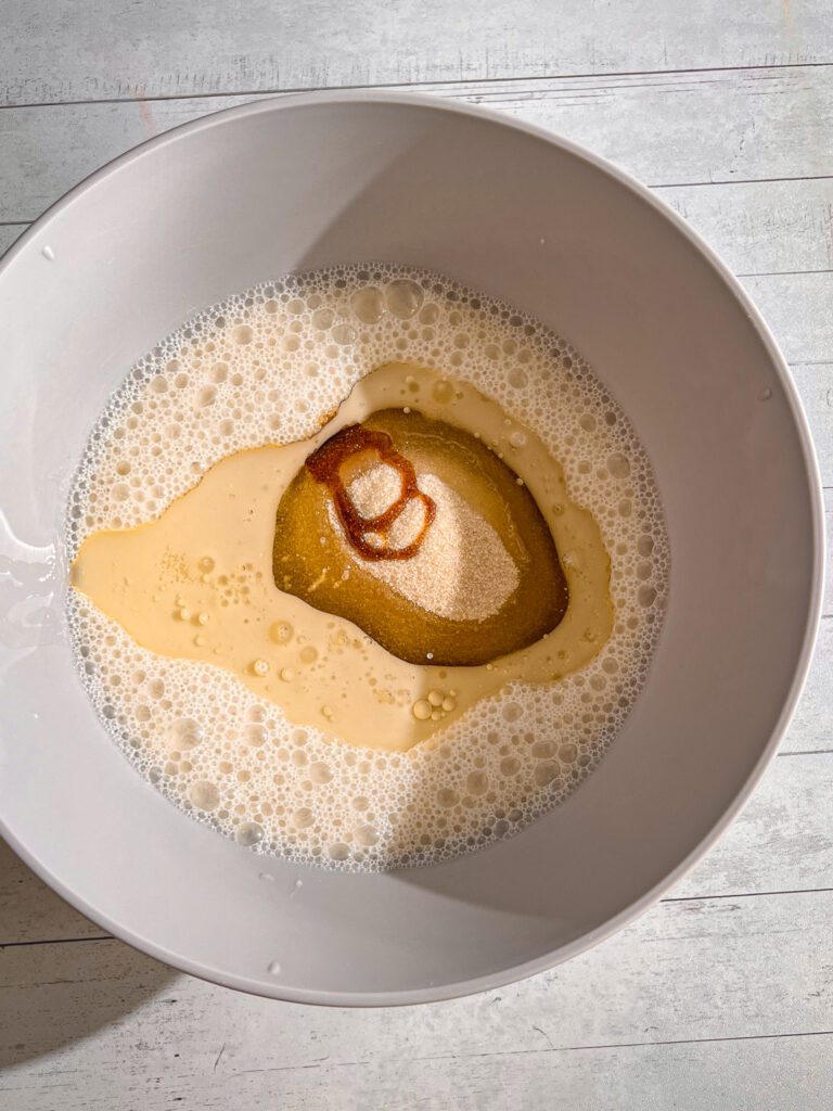 Mixing liquid ingredients for eggless vanilla sponge cake batter