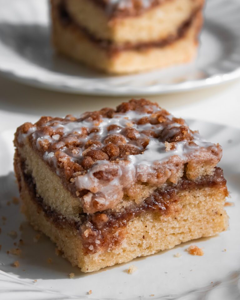 Eggless Starbucks Coffee Cake sliced on a plate