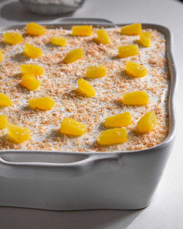 Homemade pineapple coconut refrigerator cake served chilled