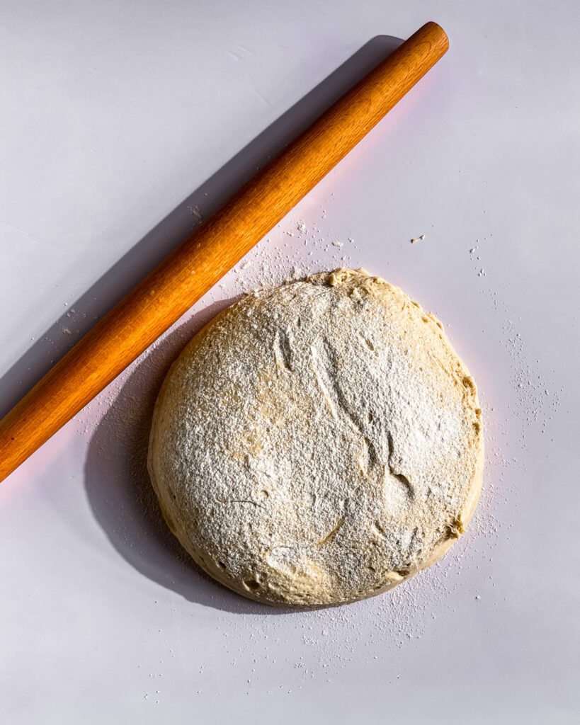 Ready to roll cinnamon dough into a rectangle