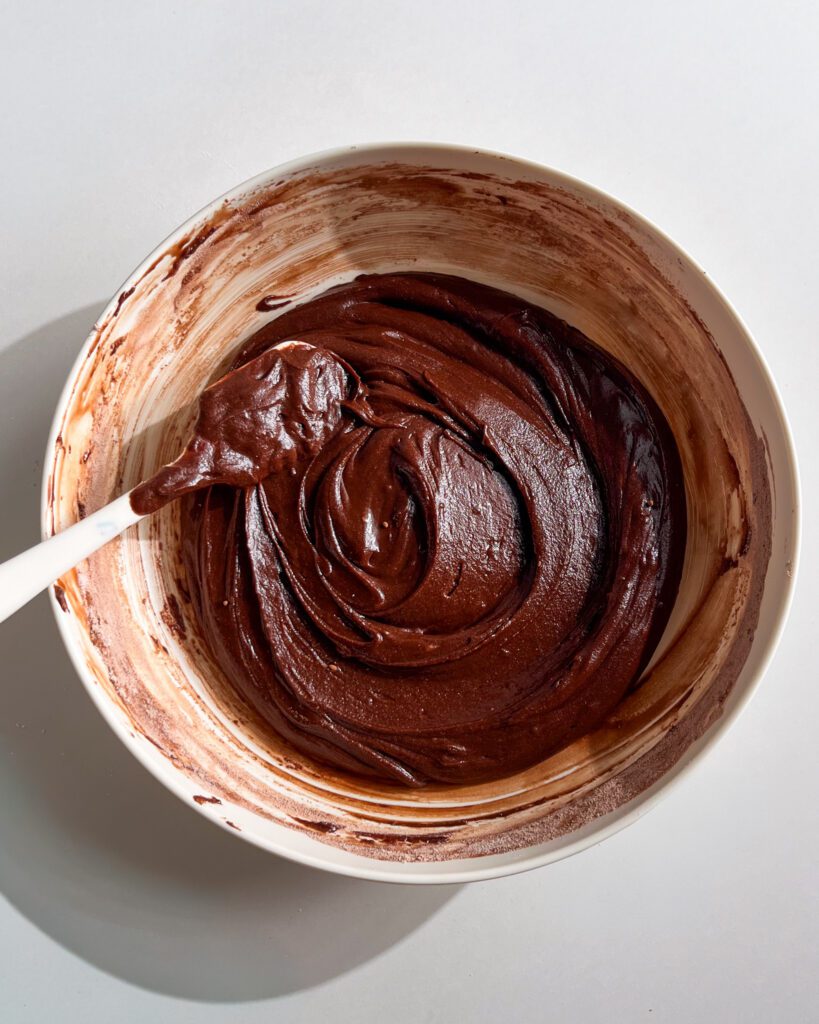 Thick fudgy brownie batter prepared for brookie cookies