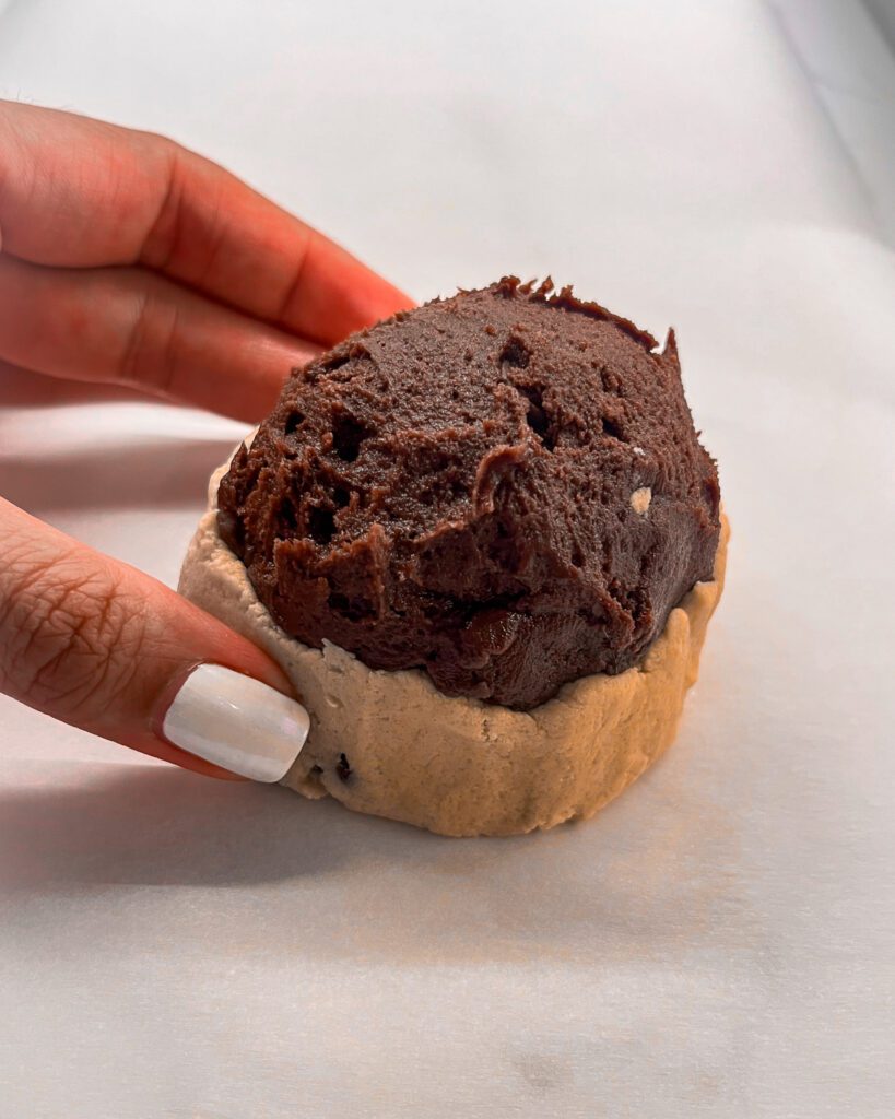 Wrapping cookie dough around the brownie batter