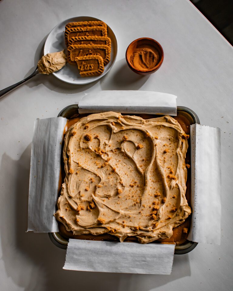 Creamy Biscoff buttercream being mixed for chocolate snack cake