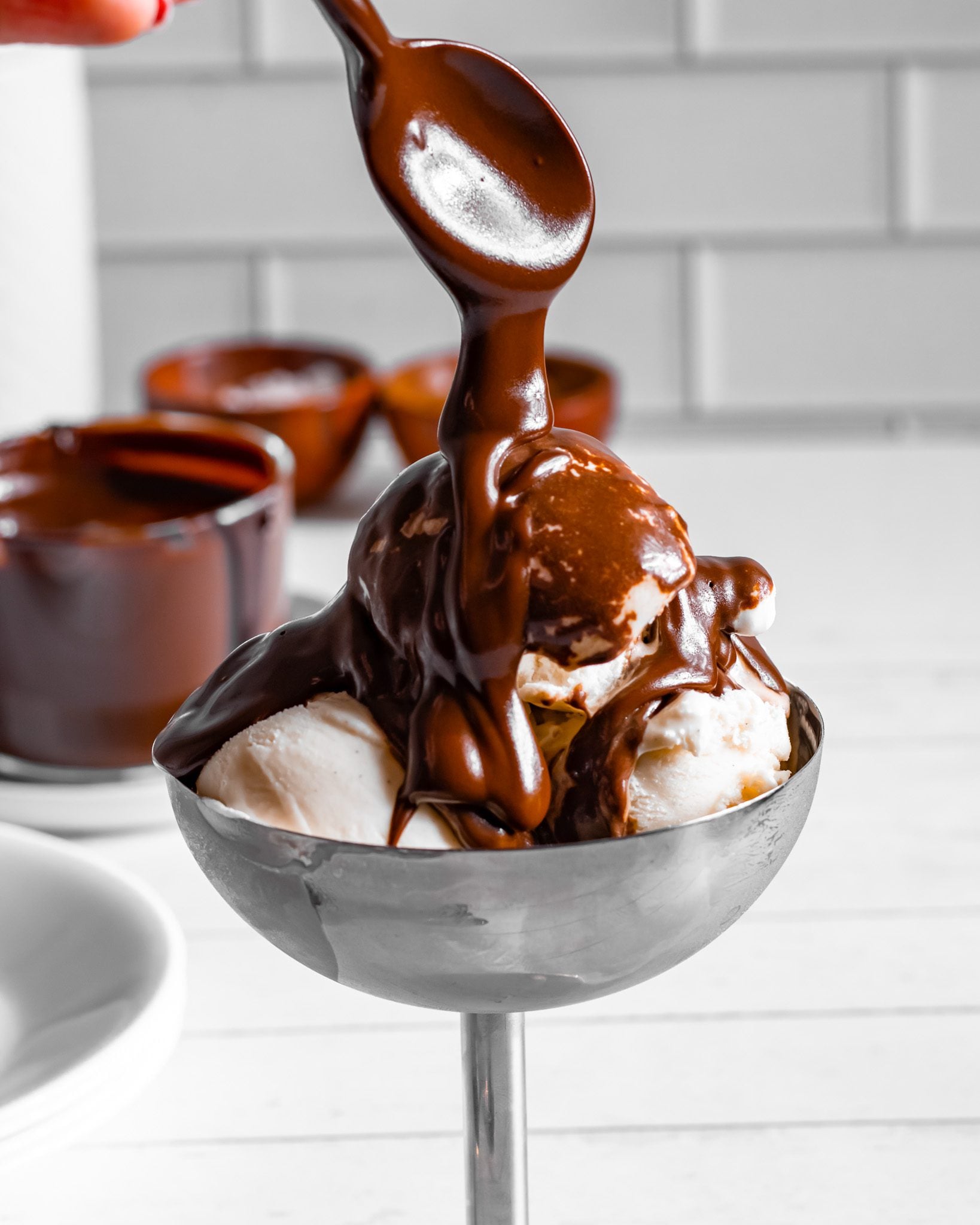 chocolate-fudge-sauce-over-vanilla-ice-cream